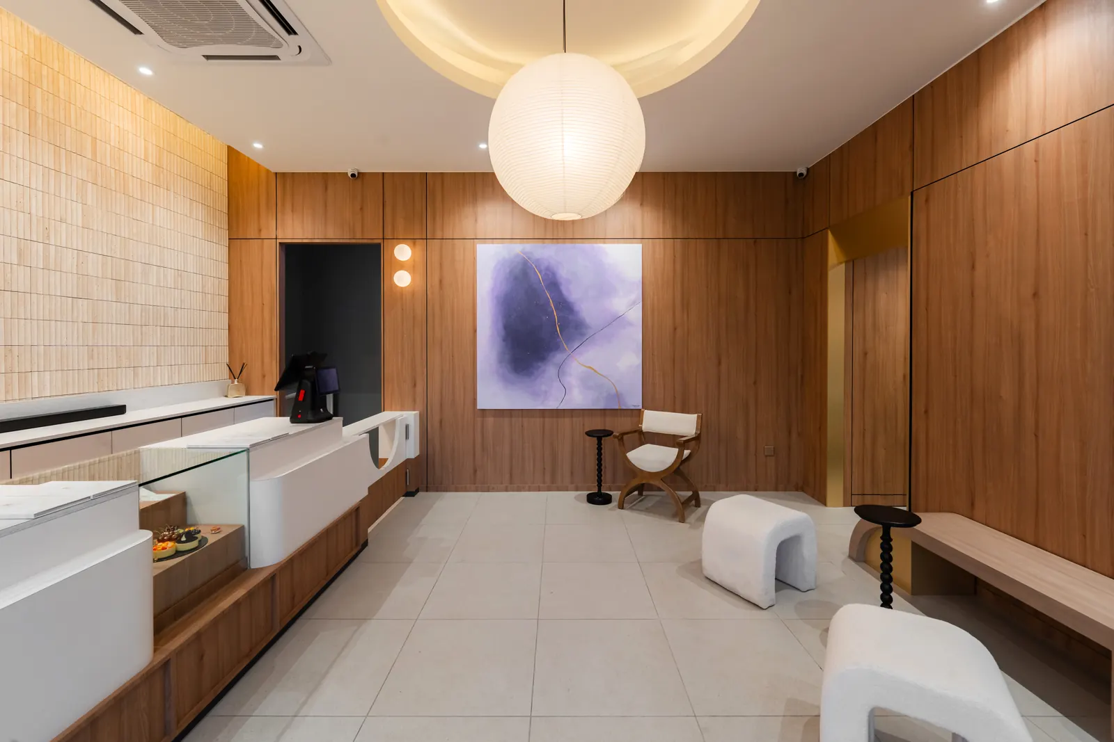 The lounge, walnut and travertine